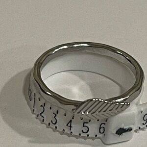 Silver toned hammered feather ring​​​​​​